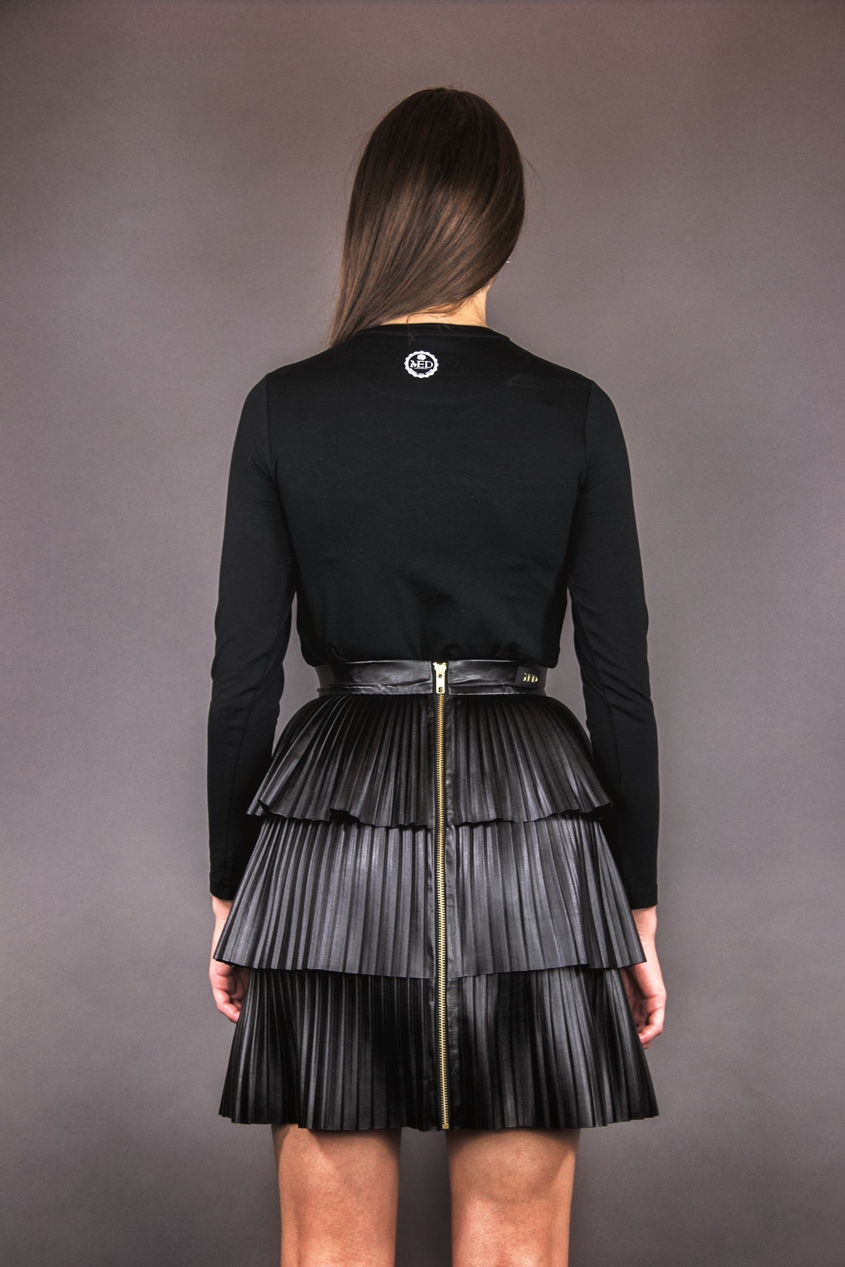 Plissee - Rock aus veganem Lederimitat mit Stufen und Volants - schwarz - Manuel Essl Design